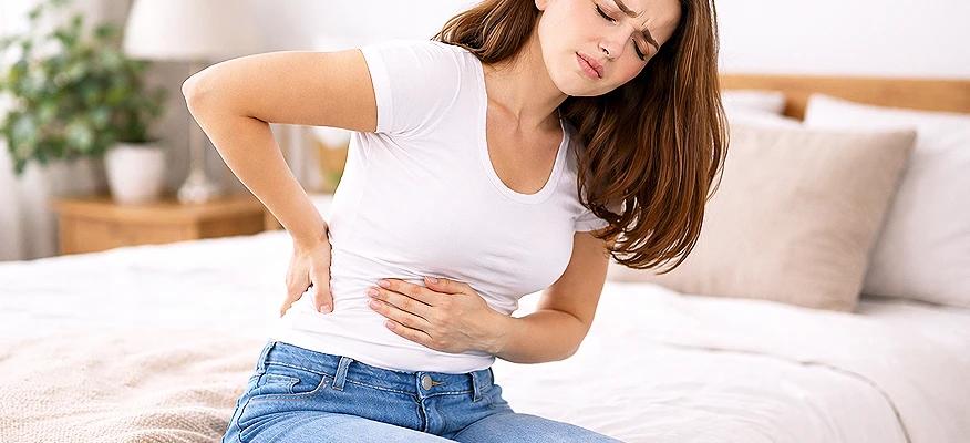 Bloating and back pain caused by digestive gas pressure