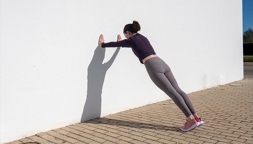 Elevate your strength with wall push-ups