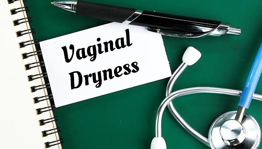 Vaginal dryness note with pen and stethoscope, women’s health concept.