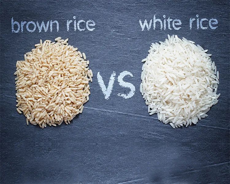 Brown rice and white rice in a heart-shaped bowl